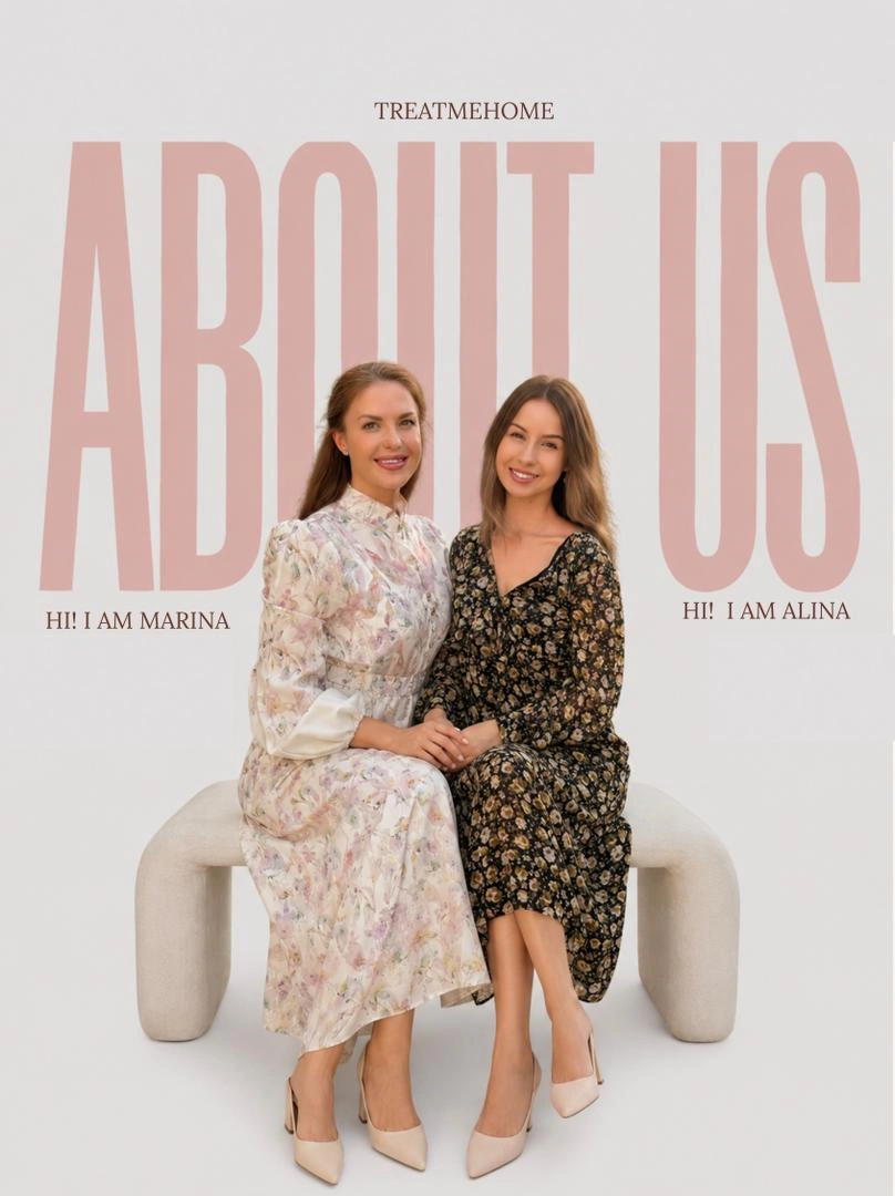 Marina and Alina, founders of treatmehome, seated together on a cream bench under the words About Us