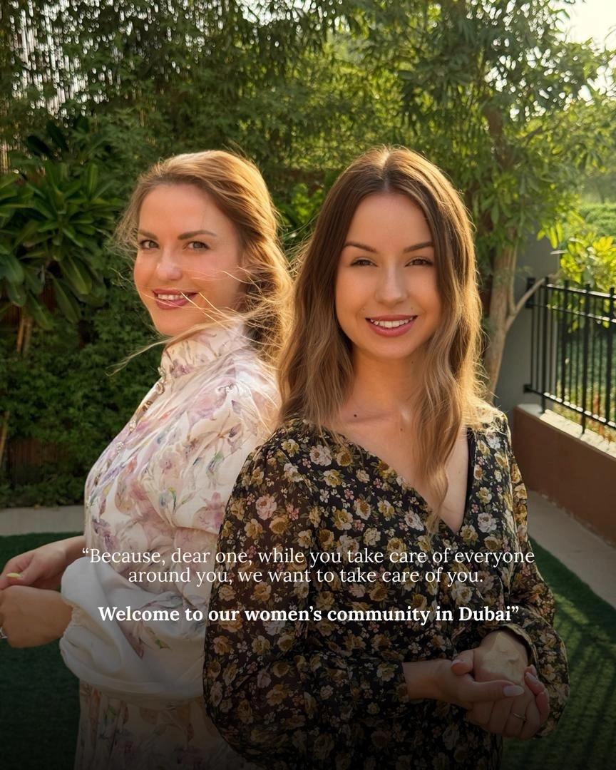 Marina and Alina standing back to back in a garden, smiling, beside the words: because, dear one, while you take care of everyone around you, we want to take care of you